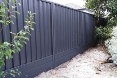 colorbond fence with retaining wall
